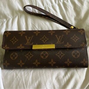 Repurposed Louis Vuitton travel makeup set with 12 brushes.